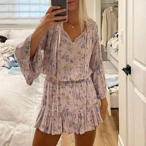 Purple dress/romper with built in shorts underneath! Size medium can fit small!